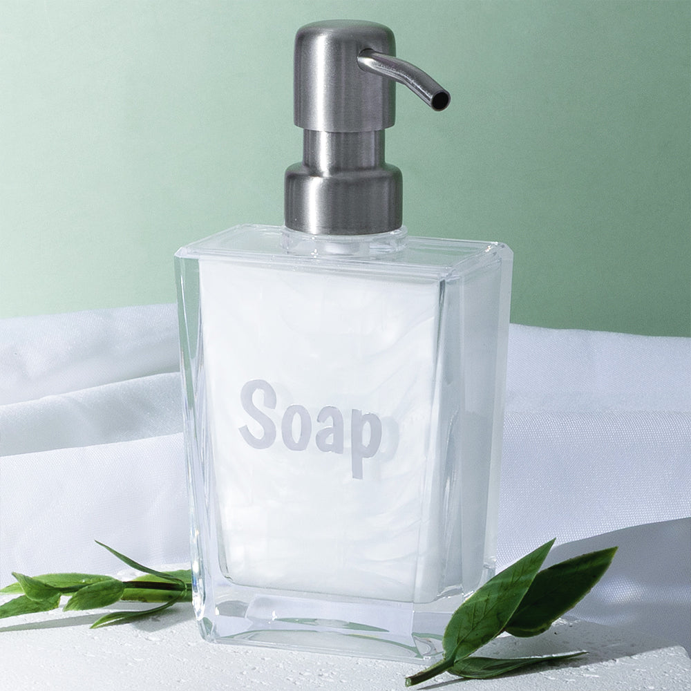 soap dispenser over green background