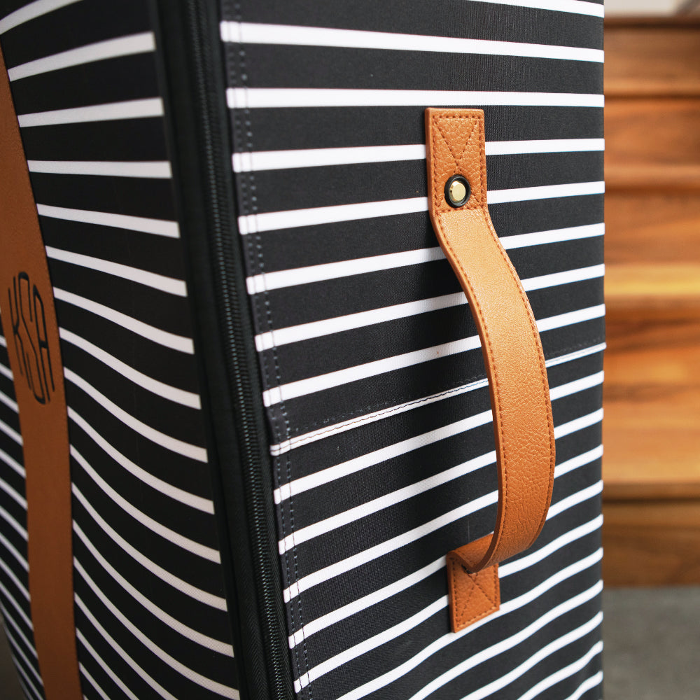 handle on monogrammed suitcase