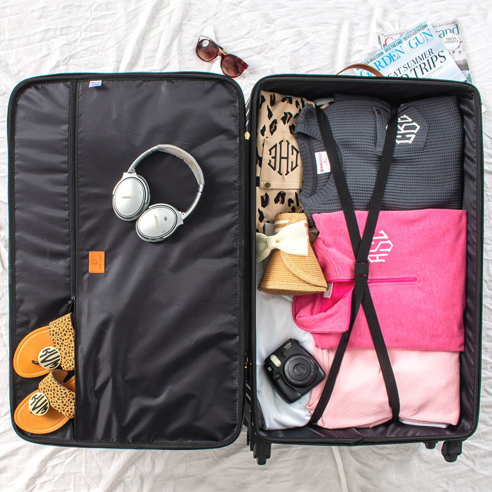 inside of large monogrammed suitcase