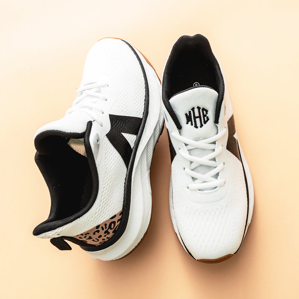 white leopard sneakers studio shot