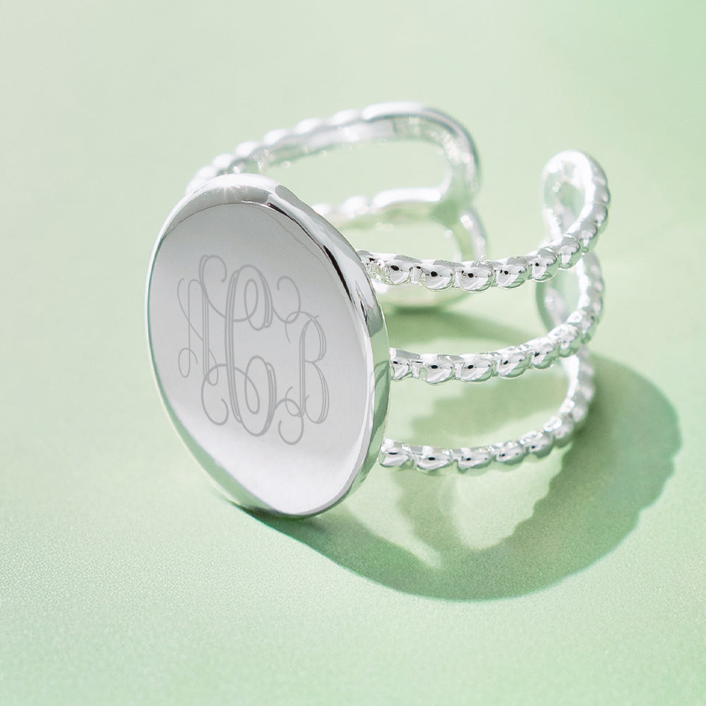 monogrammed statement ring on sage