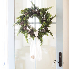 ivory wreath sash on door