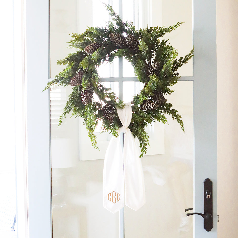 ivory wreath sash on door