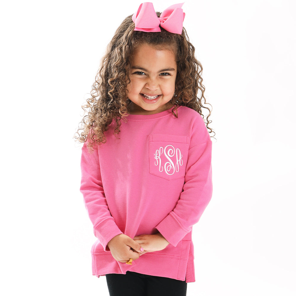 girl wearing hot pink crewneck sweatshirt