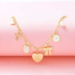 gold charm necklace studio shot
