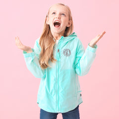 mint kids lightweight rain jacket on addie