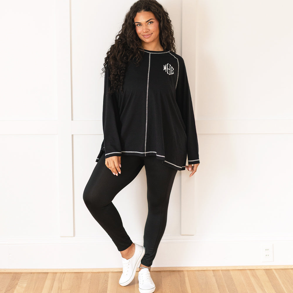 girl wearing black athleisure layering tee