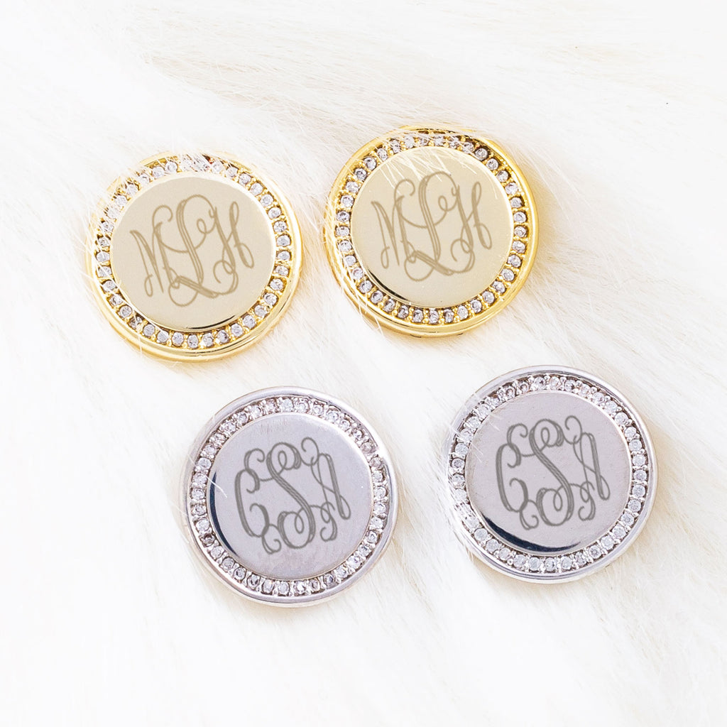 pave disc earrings on white fur