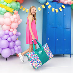 2026 watercolor cheetah kids weekend bag carried by girl