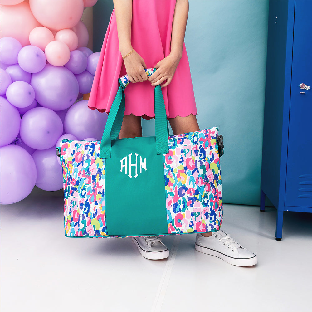 2026 watercolor cheetah kids weekend bag held by girl