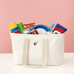 anderson solid ivory market basket with tailgate items