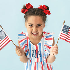 close up of americana monogrammed ruffle knit dress
