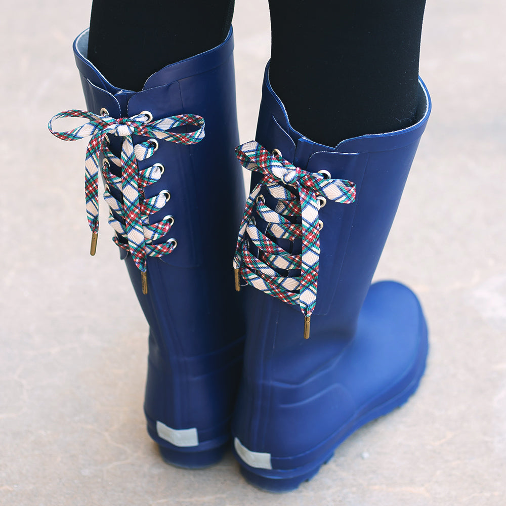 plaid shoe laces on navy rain boots