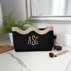 wavy top cosmetic bag on bathroom counter