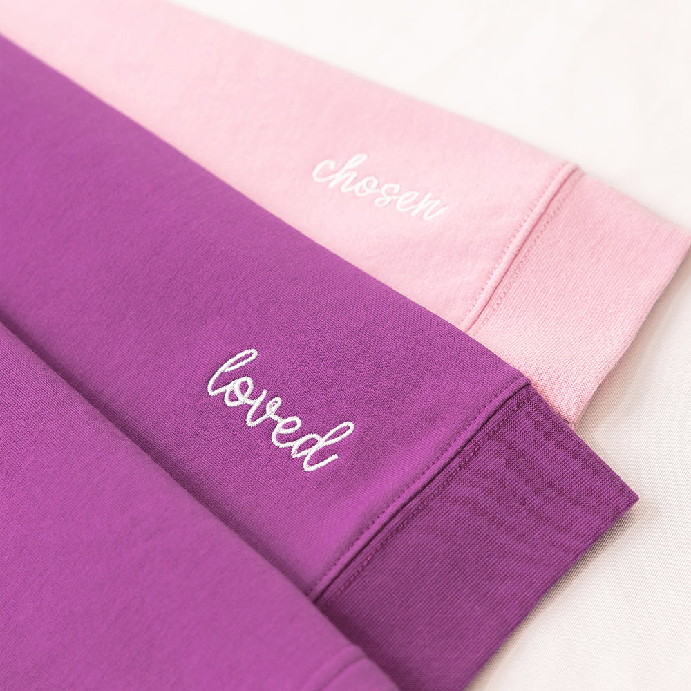 close up of loved and chosen embroidery detail on faith pullover