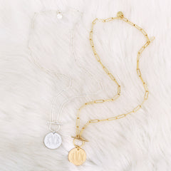 monogrammed pendant necklaces in gold and silver