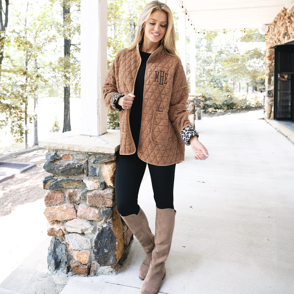 [Rachel] girl wearing monogrammed quilted coat in almond