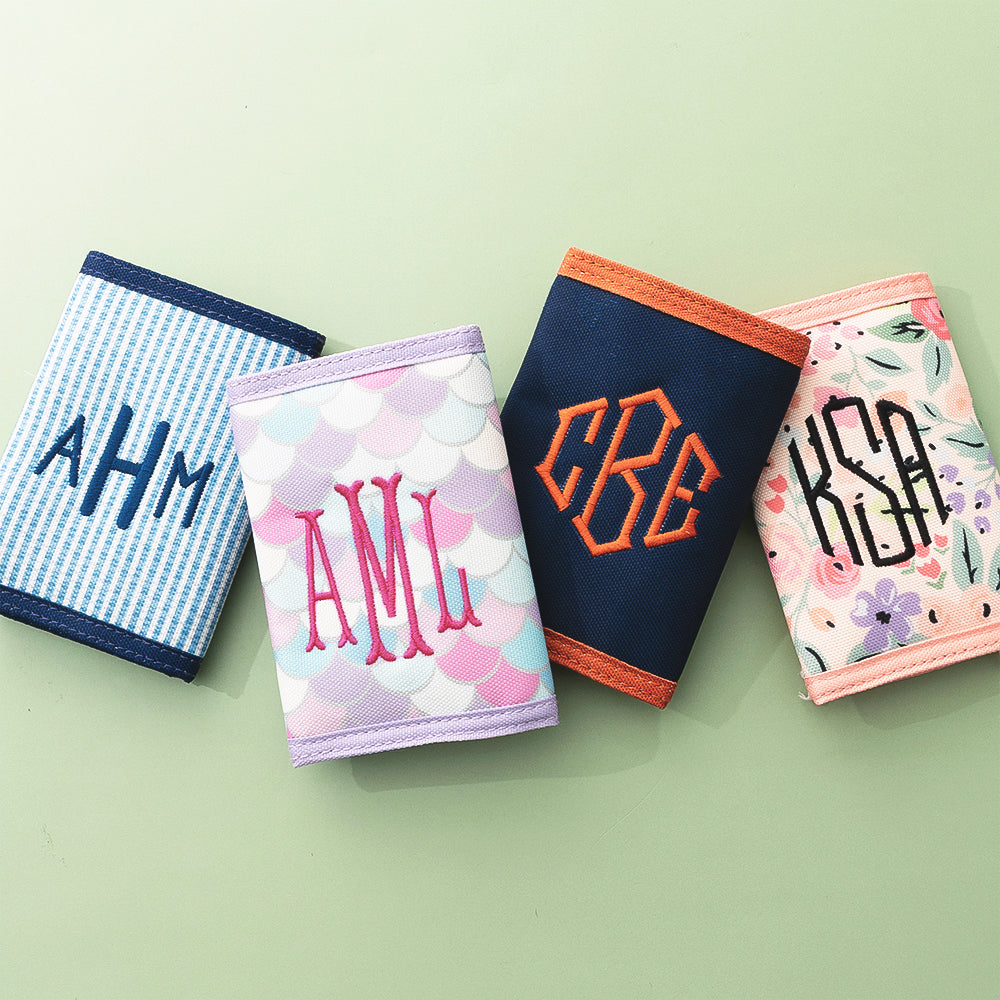 4 kids wallet group flatlay green