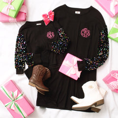 mom and me sequin dress flatlay