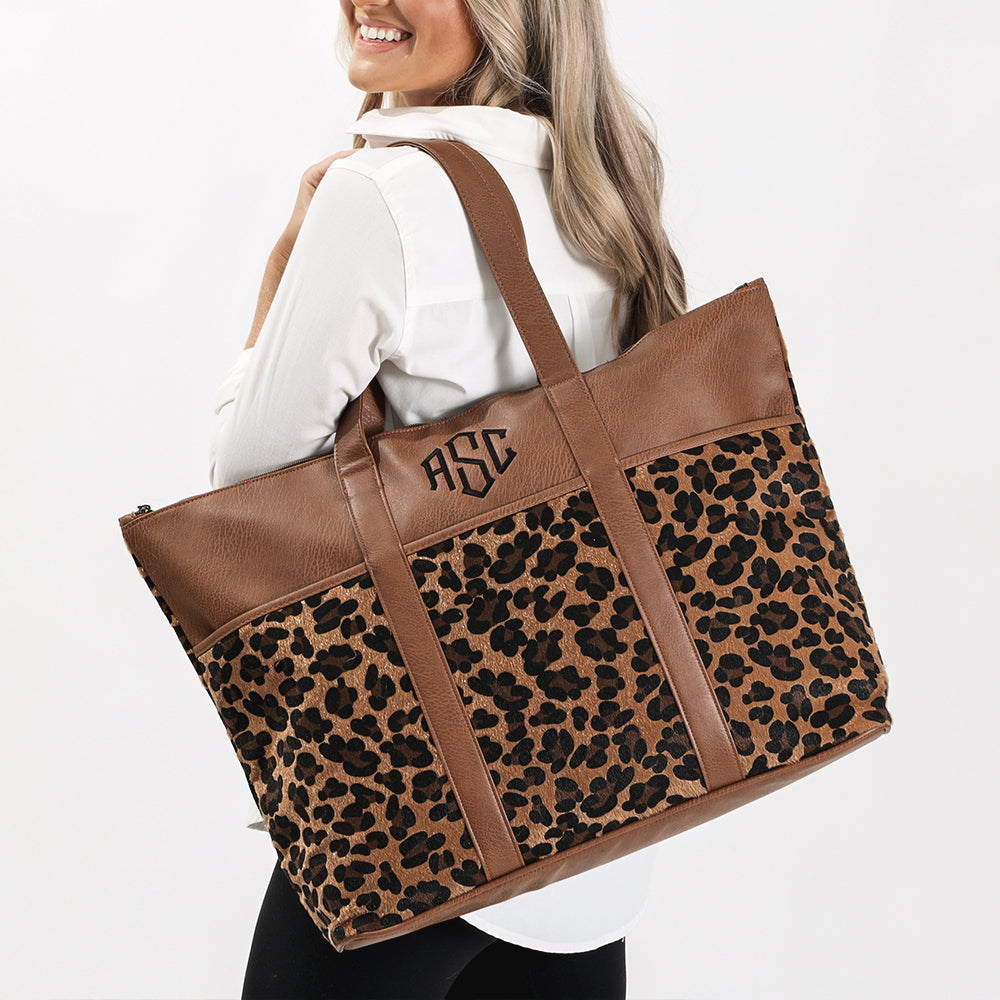 leopard pocket tote on shoulder