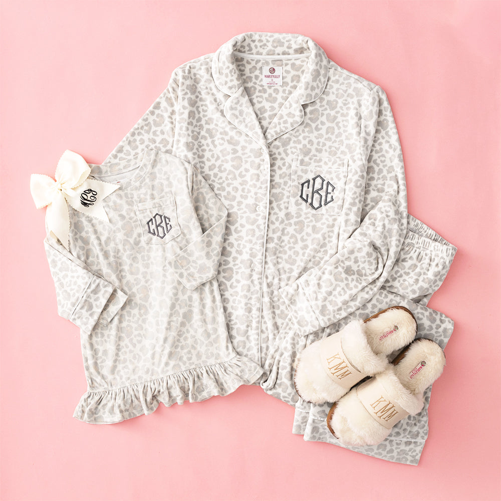 snow leopard mom and me flatlay