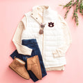 white puffer vest auburn flatlay