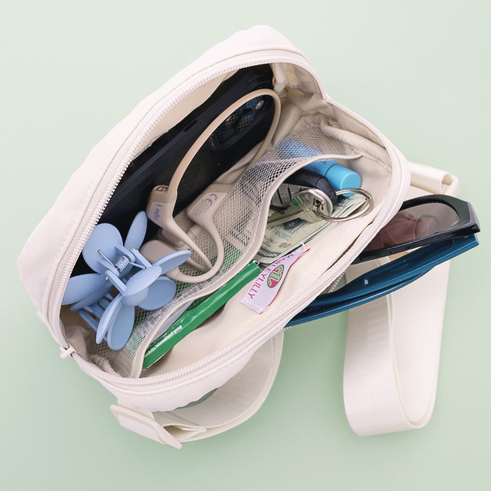 inside of champagne monogrammed belt bag