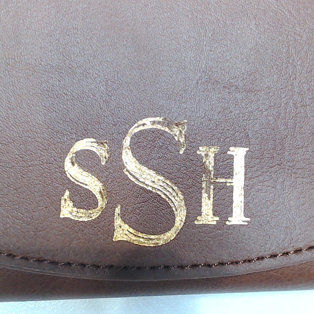 BLOOPER ACCESSORY: Monogrammed Leather Wallet