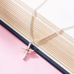 cable cross necklace detail shot