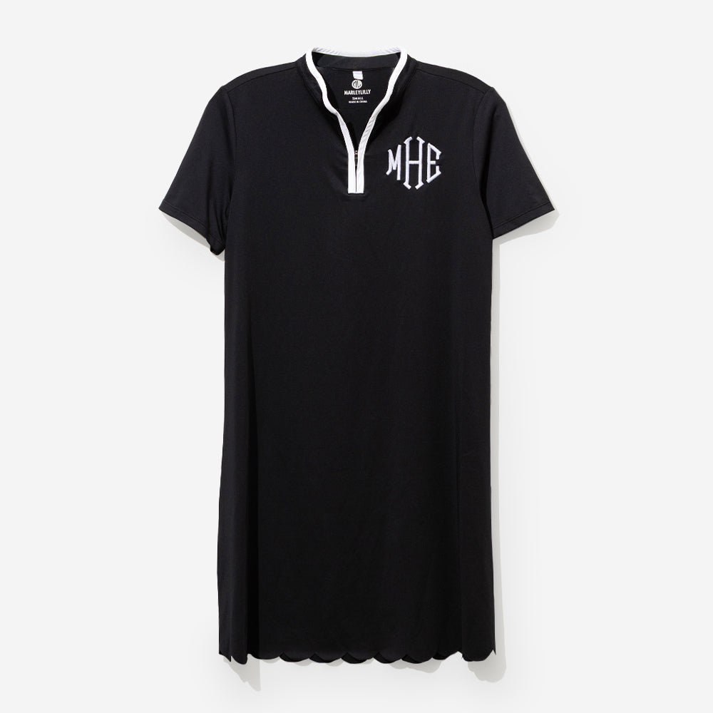 monogrammed quarter zip dress in black sp26