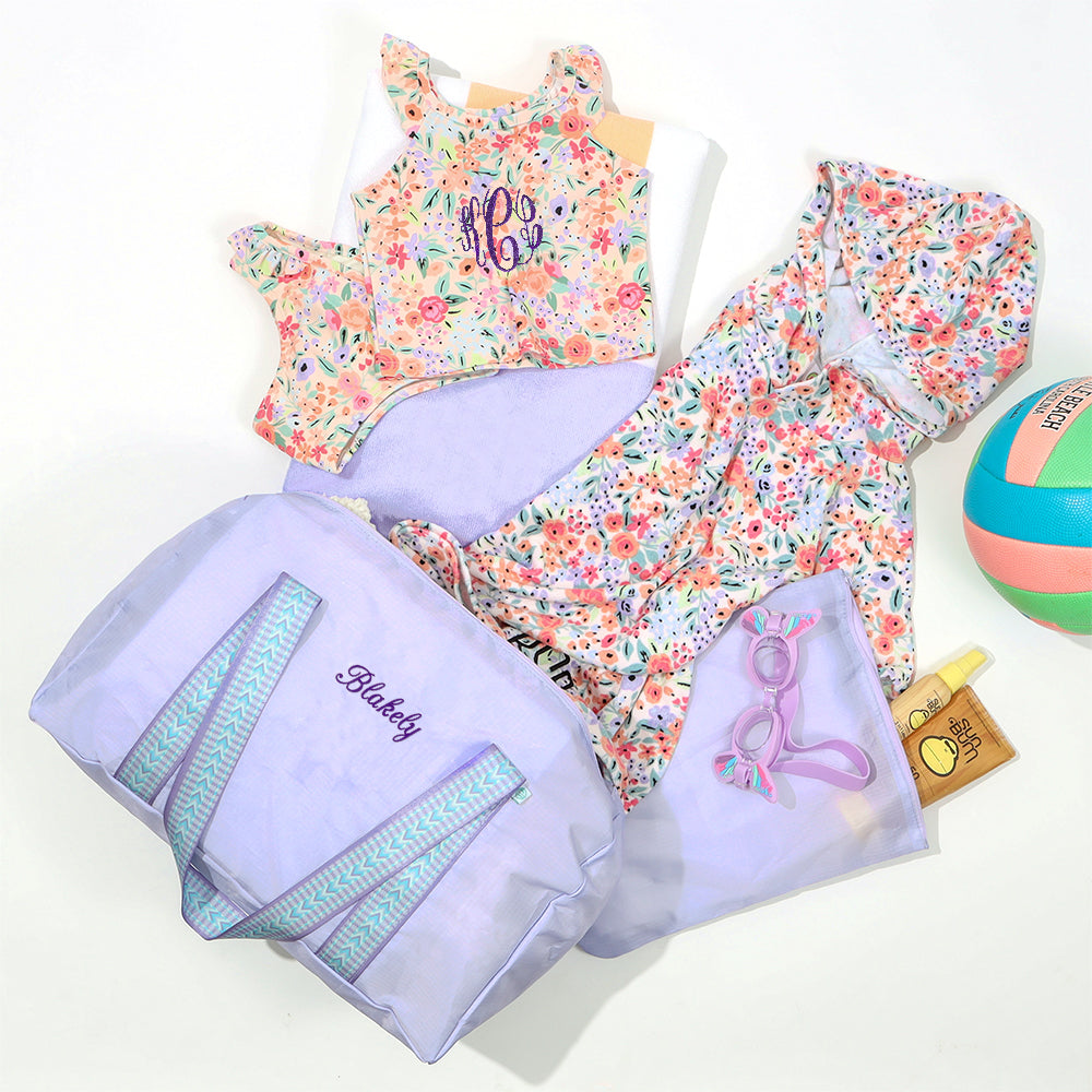 lavender activity bag with swim items
