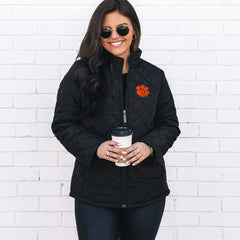 model wearing black clemson puffer jacket
