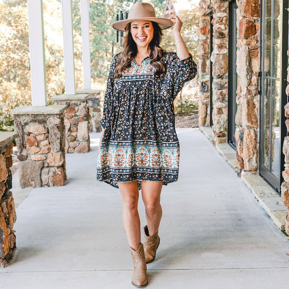[Peyton] puff sleeve black paisley dress with wide brim hat and cowboy boots