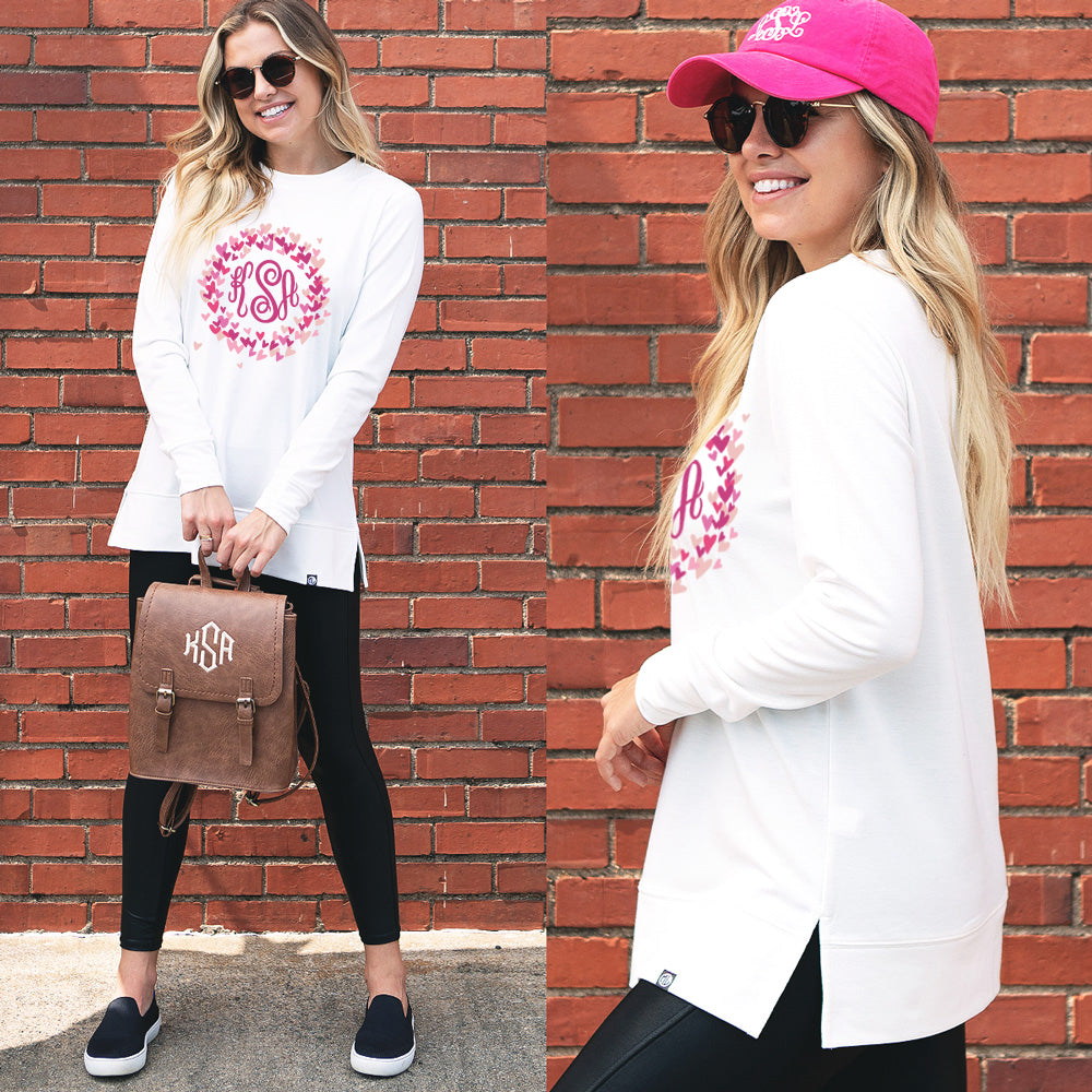front and side view of personalized valentines crewneck in valentine hearts