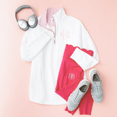 pink seersucker quarter zip sweatshirt flatlay