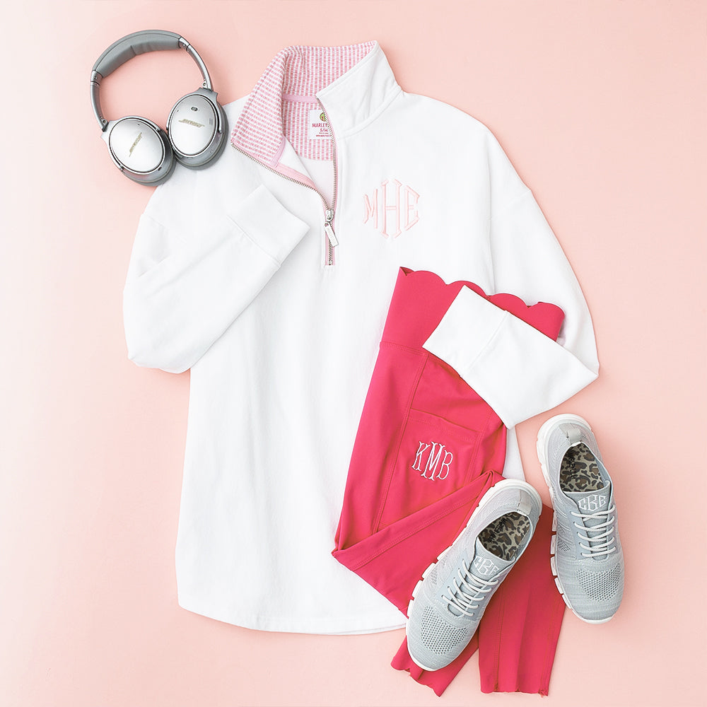 pink seersucker quarter zip sweatshirt flatlay