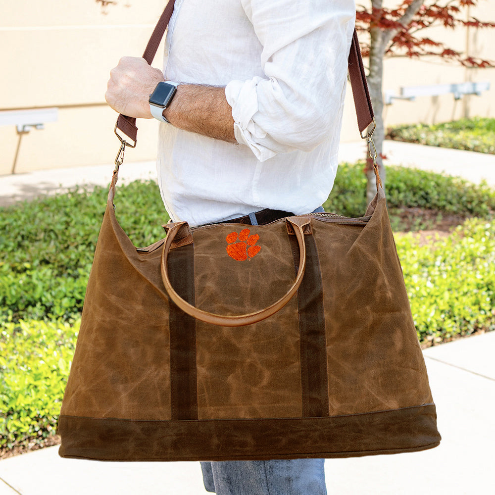 sp23 clemson canvas weekender on shoulder