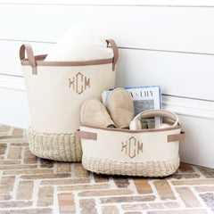 ivory and tan stair basket with storage basket on porch