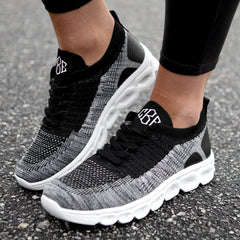sneakers on gravel