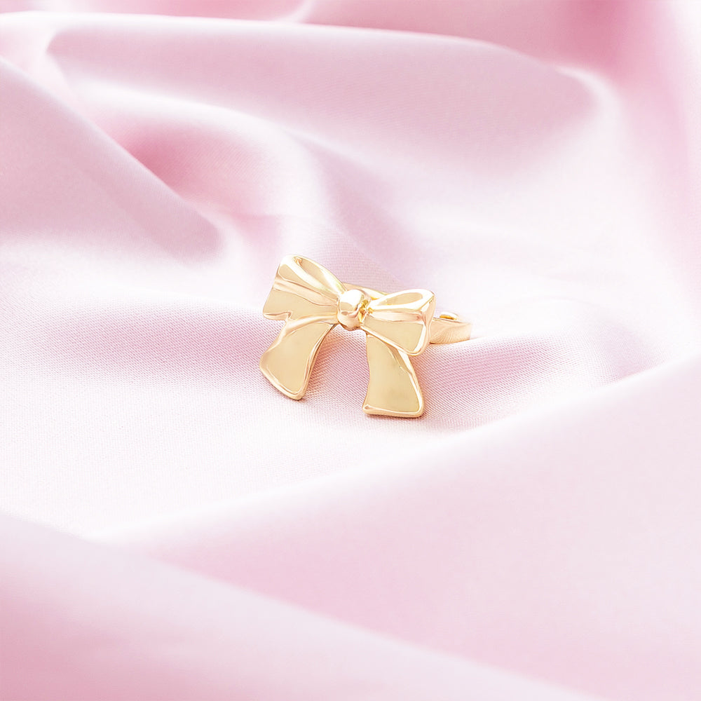 Adjustable Bow Ring on pink satin