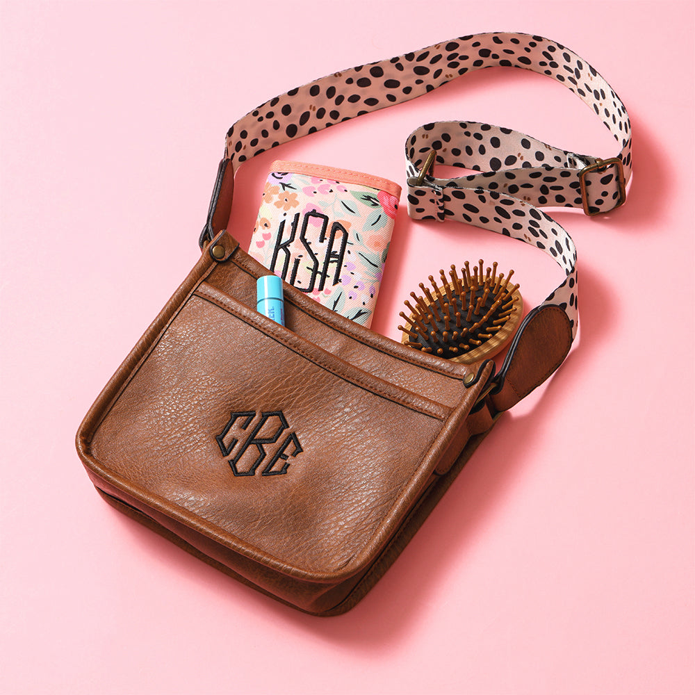 white leopard kids saddlebag flatlay