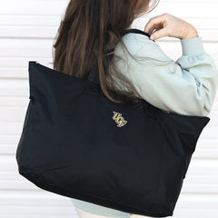 UCF Knights Packable Duffel Bag on Shoulder