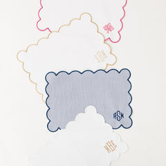 group of 4 scalloped placemats
