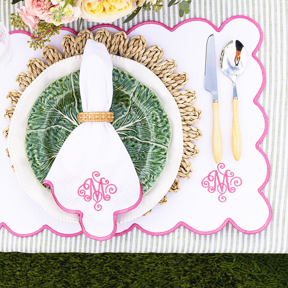 pink scalloped placemat and napkin close up