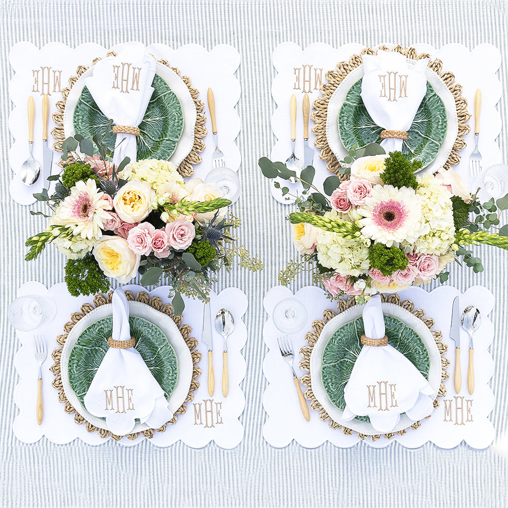 white scalloped placemat table settings