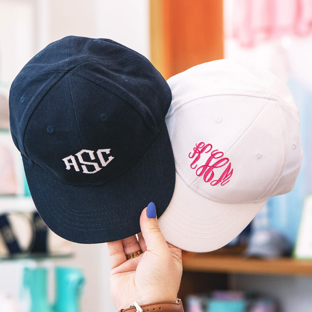 kids baseball hats in navy and white