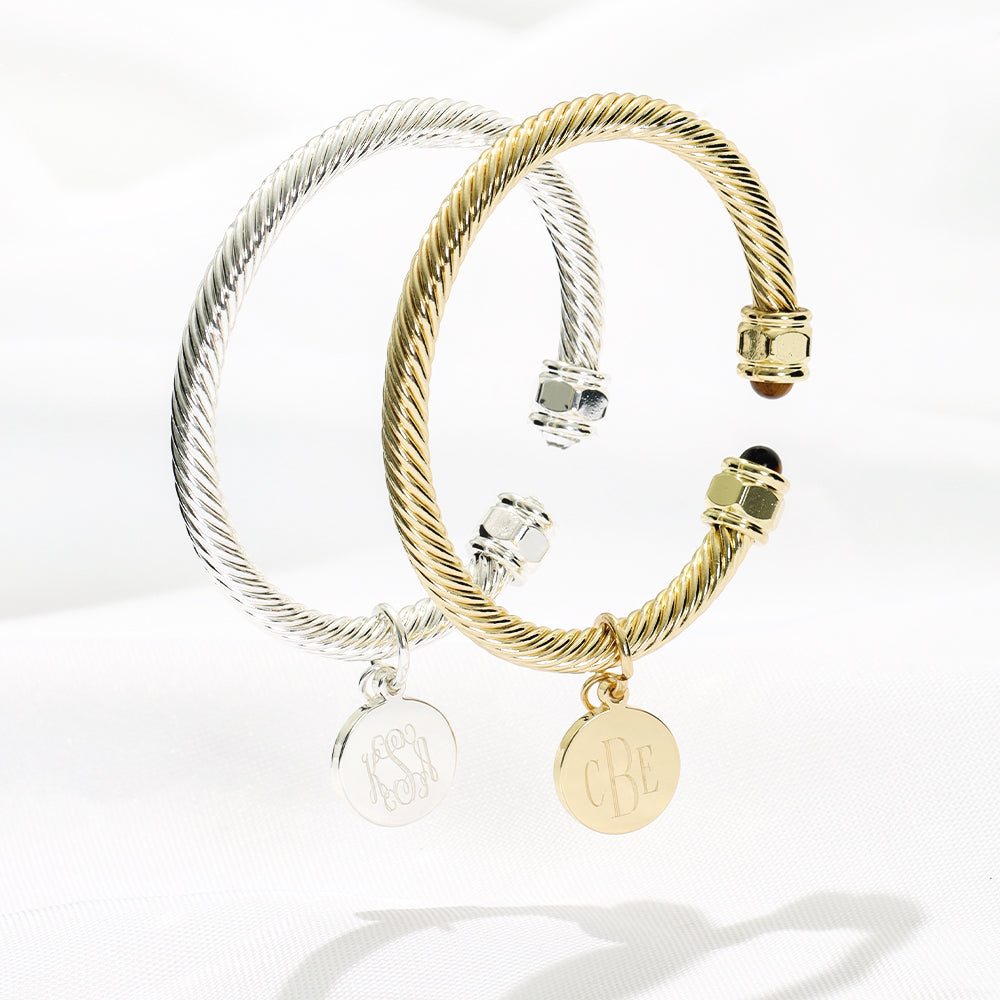 duo cable bracelets in gold and silver