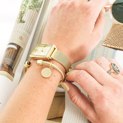 gold cable bracelet on arm