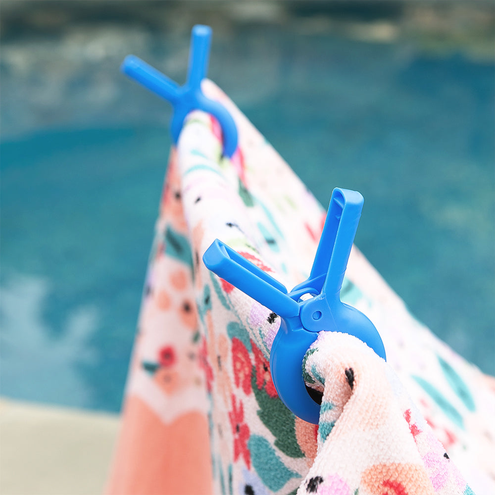 blue beach chair towel clips with coral floral towel