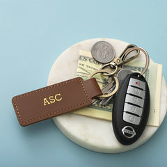 Brown personalized keychain on dish
